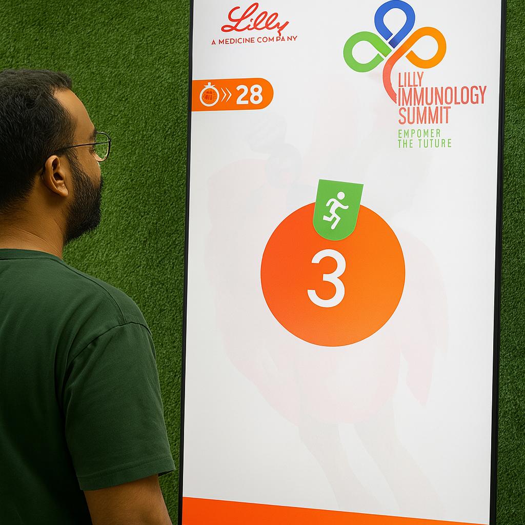 Participants enjoying the Squat Game Challenge at a corporate event in Dubai, engaging in fitness and team-building through real-time interactive squat tracking.